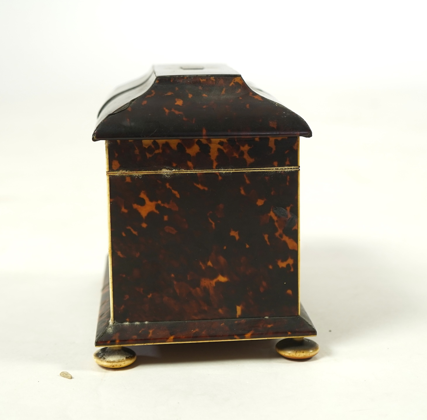 An early Victorian tortoiseshell tea caddy